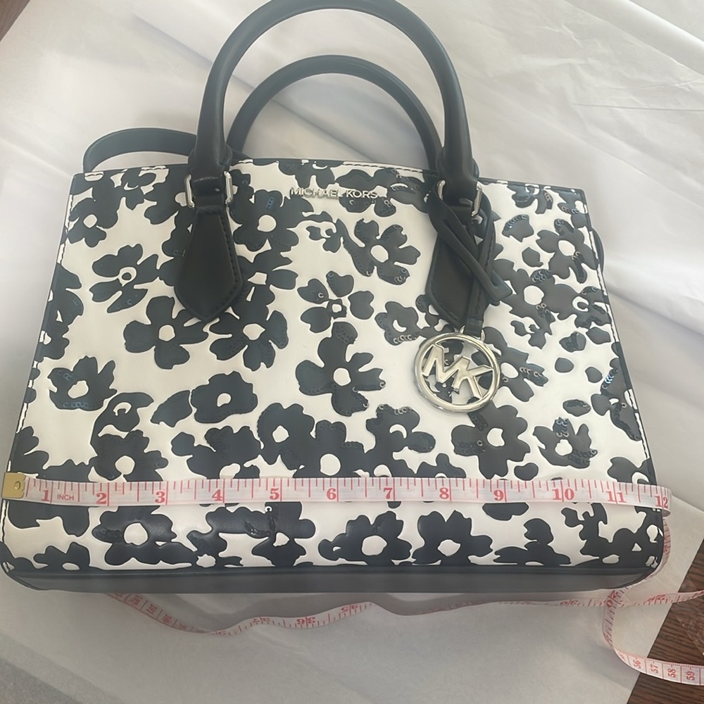 Michael Kors Black and White Floral Satchel with Elegant Detailing.